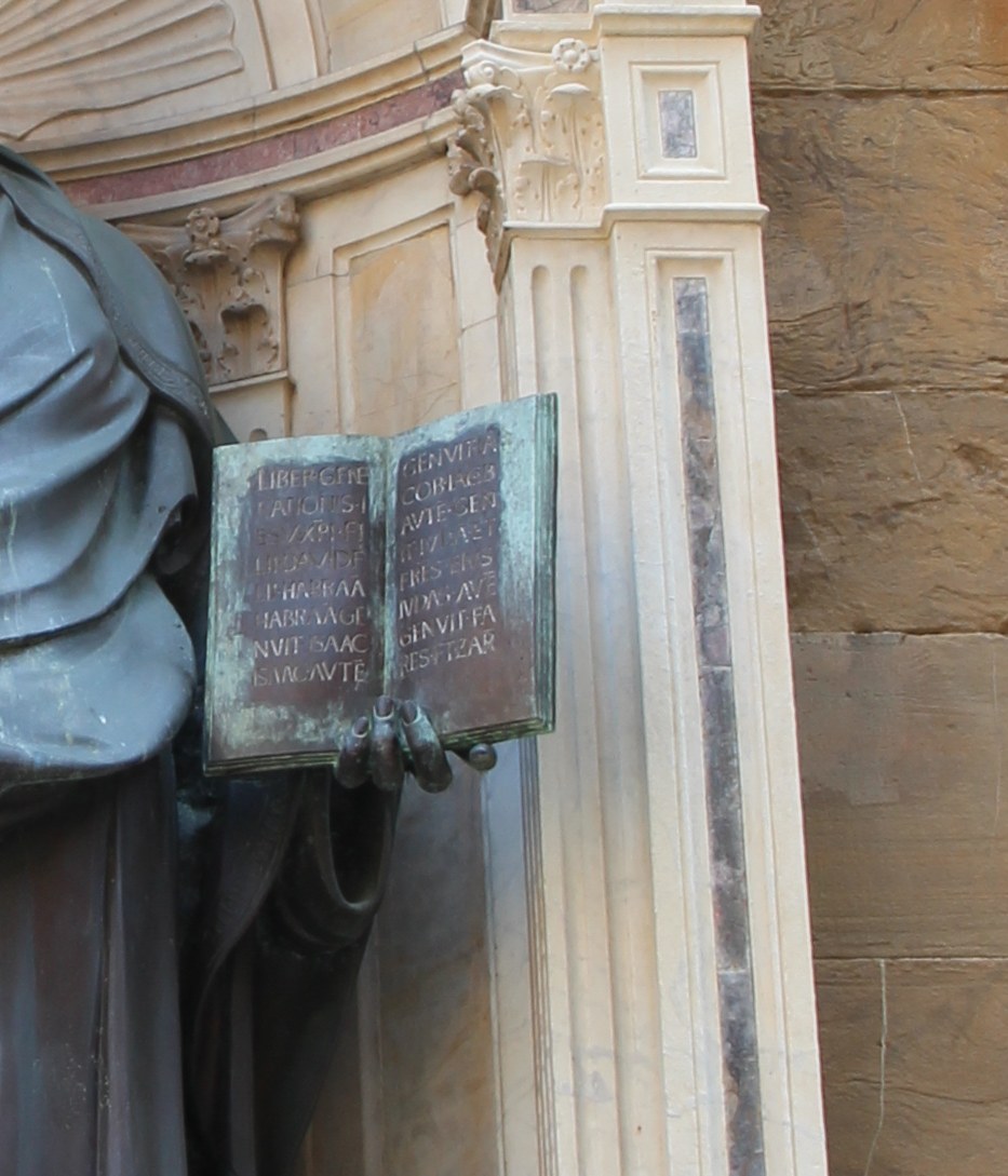 Open Gospel book detail from the exterior replica of Ghiberti’s St Matthew